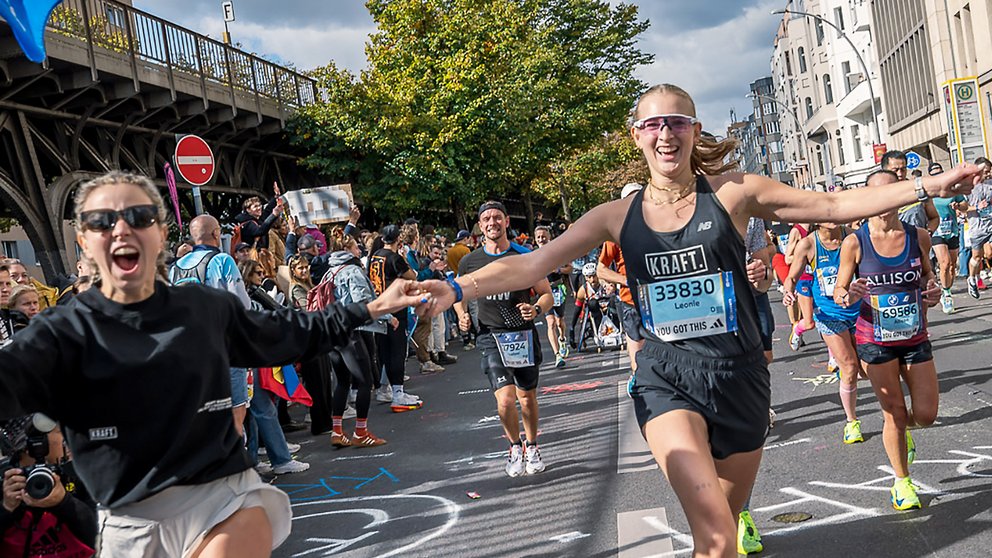 Teilnehmerin bei einem Stadtlauf organisiert von KRAFT Runners