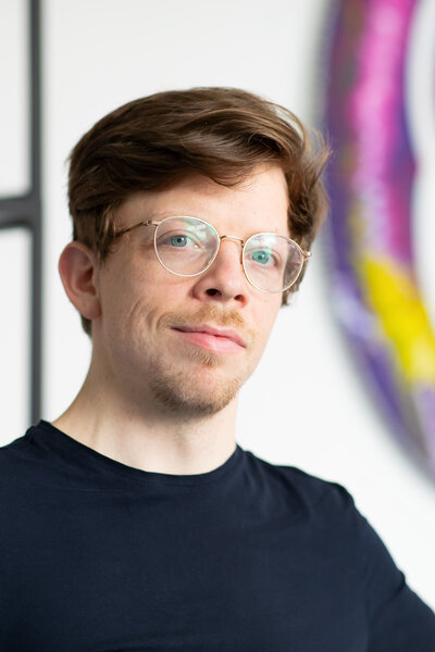 Potraitbild des Geschäftsführers Tim Waleschkowski