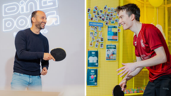Kian Pariwar und ein anderer Mann beim Ping Pong spielen.